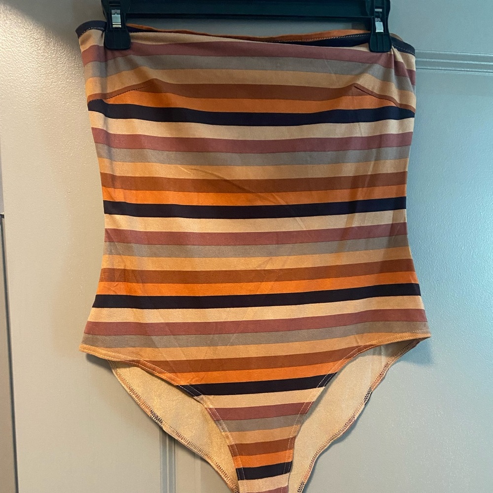 Boutique body suit worn once